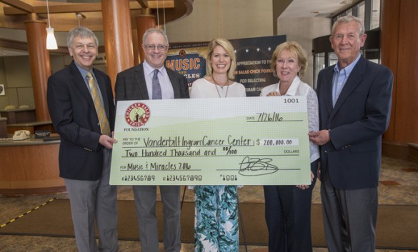 From left, Scott Hiebert, Ph.D., Jordan Berlin, M.D., Stacy Brown, Betty McWhorter and Earlon McWhorter pose with the check presented by the Chicken Salad Chick Foundation to Vanderbilt-Ingram Cancer Center. (photo by John Russell)