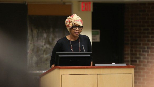 Vanderbilt University School of Medicine student Efi Akam reads a poem at Wednesday’s Memorial Service for Recent Victims of Violence in America and the World. (photo by John Russell)