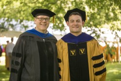Tyler McCann, Ph.D. (Cell and Developmental Biology), right, with his mentor, William Tansey, Ph.D. (photo by Daniel Dubois)