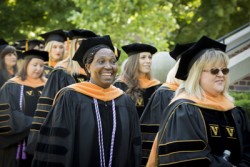 School of Nursing graduate Mary Muchendu smiles as students line up for the main ceremony. (photo by Susan Urmy)