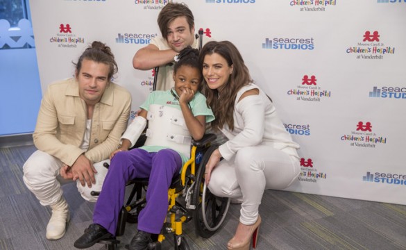 Kemarri Willingham, 7, poses for a photo with Reid, Kimberly and Neil Perry of The Band Perry at this week’s Teen Cancer America fundraising kickoff event at Monroe Carell Jr. Children’s Hospital at Vanderbilt. (photo by John Russell)