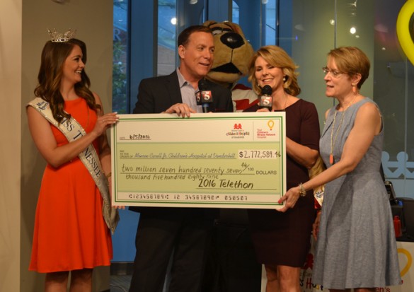 Miss Tennessee Hannah Robison, WTVF News Channel 5 anchors Rhori Johnston and Carrie Sharp along with Meg Rush, M.D., Children’s Hospital chief-of-staff, unveil the total raised for the 2016 telethon.