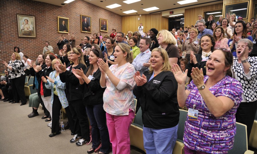 The crowd applauds at Wednesday's Magnet event in 208 Light Hall. (photo by John Russell)