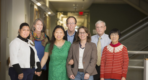 Researchers who helped uncover a new genetic clue to Angelman syndrome include, from left, Janice Williams, Ph.D., Terry Jo Bichell, Ph.D., Jing-Qiong Kang, M.D., Ph.D., Ryan Delahanty, Ph.D., Kelli Boyd, D.V.M., Ph.D., Robert Macdonald, M.D., Ph.D., and Wangzhen Shen. (photo by Susan Urmy)
