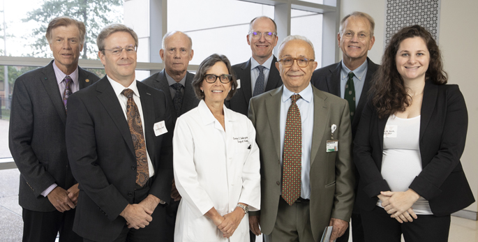 From left, Mark Evers, MD; Seth Carp, MD; Robert Coffey, MD; Carmen Solórzano, MD; J. Joshua Smith, MD, PhD; Naji N. Abumrad, MD; Steven Leach, MD; and Paula Marincola Smith, MD, PhD, pose for a photo during the R. Daniel Beauchamp Memorial Symposium at Vanderbilt University Medical Center. Not pictured, David Hanna, MD. (hoto by Erin O. Smith)