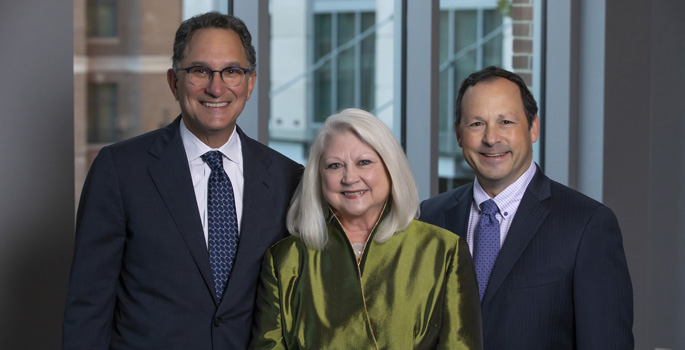 The International Retinal Research Foundation Board’s Sandra Blackwood poses with Vanderbilt’s Paul Sternberg Jr., MD, left, and David Calkins, PhD.