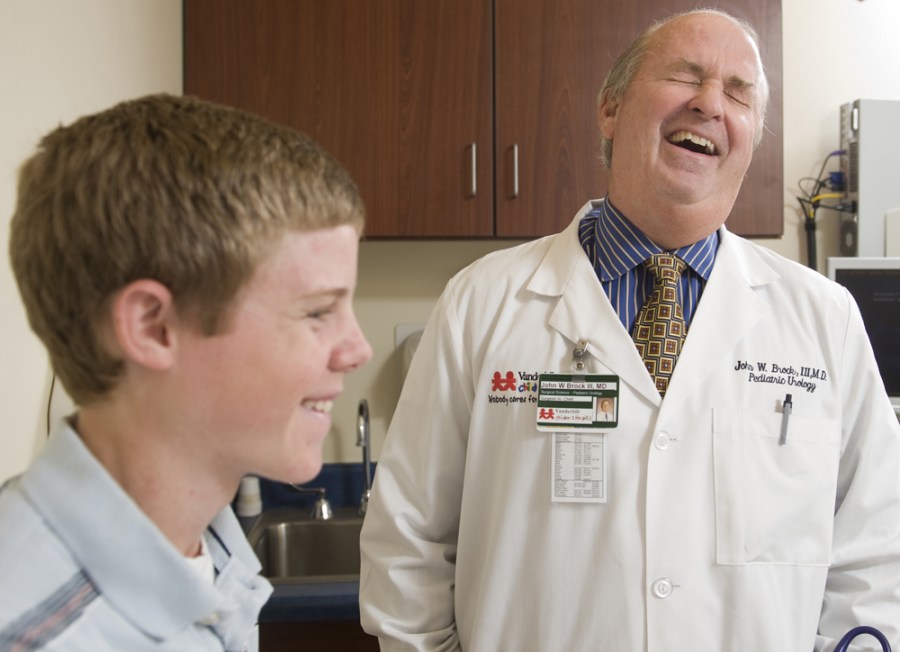 John Brock III, M.D., shares a laugh with patient Nathan Dewitt. (photo by Joe Howell)