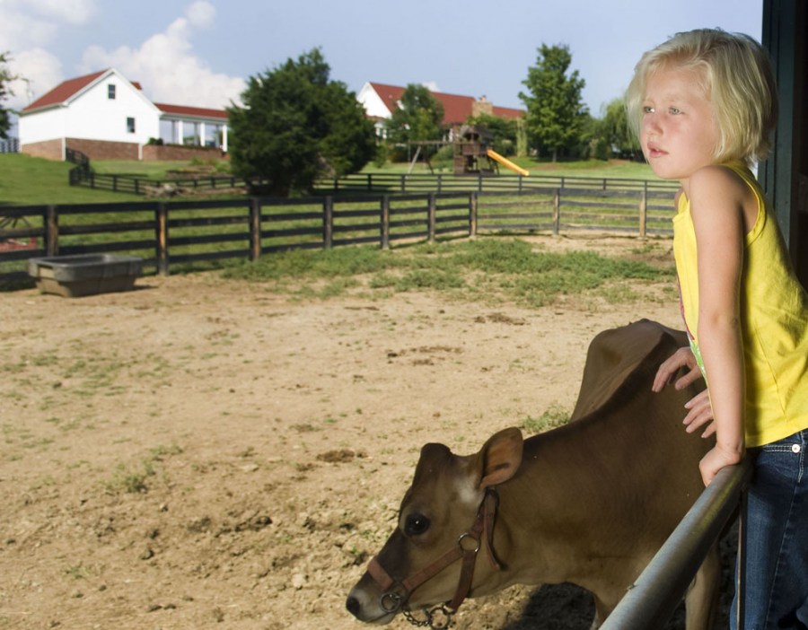 Brock’s daughter,  Anna, at the family farm. (photo by Susan Urmy)