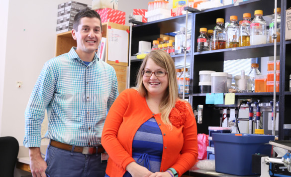 Michael Noto, M.D., Ph.D., and graduate student Jessica Moore participated in research studies showing that two bacterial pathogens cooperate with each other to co-infect the lungs of patients with cystic fibrosis. (photo by Anne Rayner)