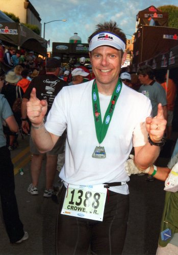 Crowe after crossing the finish line of the Ironman triathlon in Coer d’ Alene, Idaho, last July.