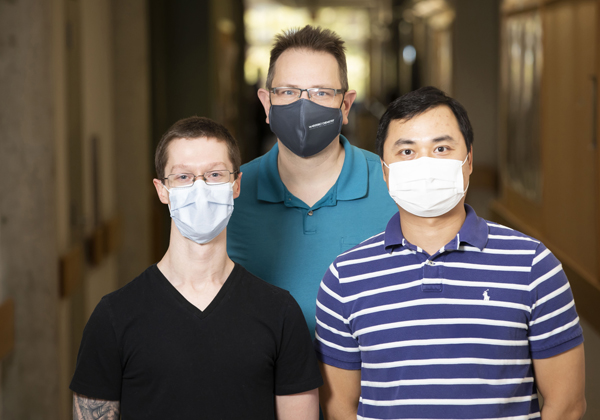 Benjamin Brown, left, Jens Meiler, PhD, Zhenfang Du, PhD, and colleagues are studying the functional consequences of genetic mutations and how those changes can drive cancerous growth.