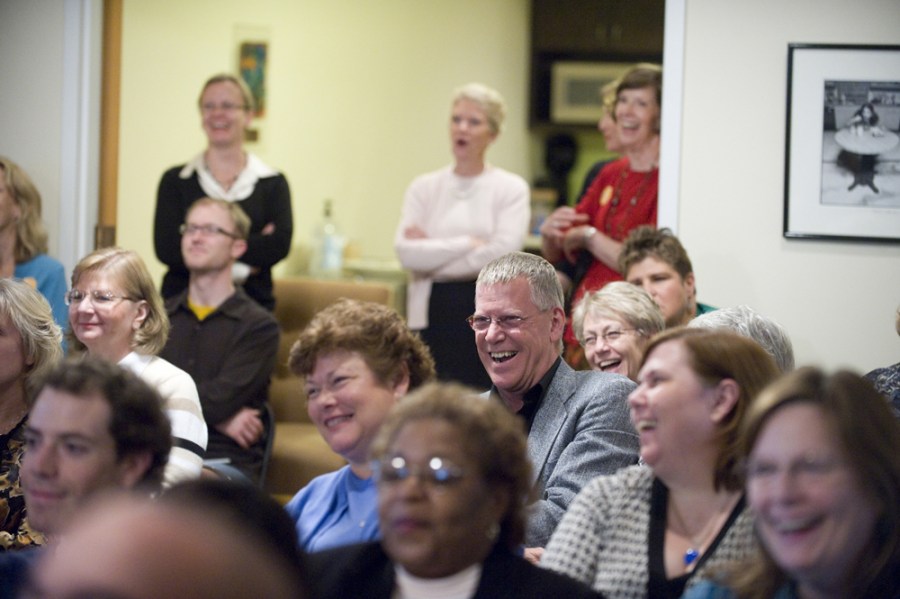 Audience members laugh during the  “Mythbusters: Cancer Research in Jeopardy” program. (photo by Joe Howell)