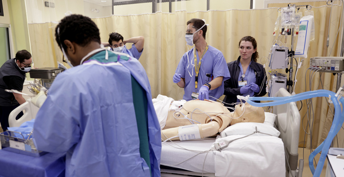 The multidisciplinary team conducted the bedside surgery simulation in the Center for Experiential Learning and Assessment.