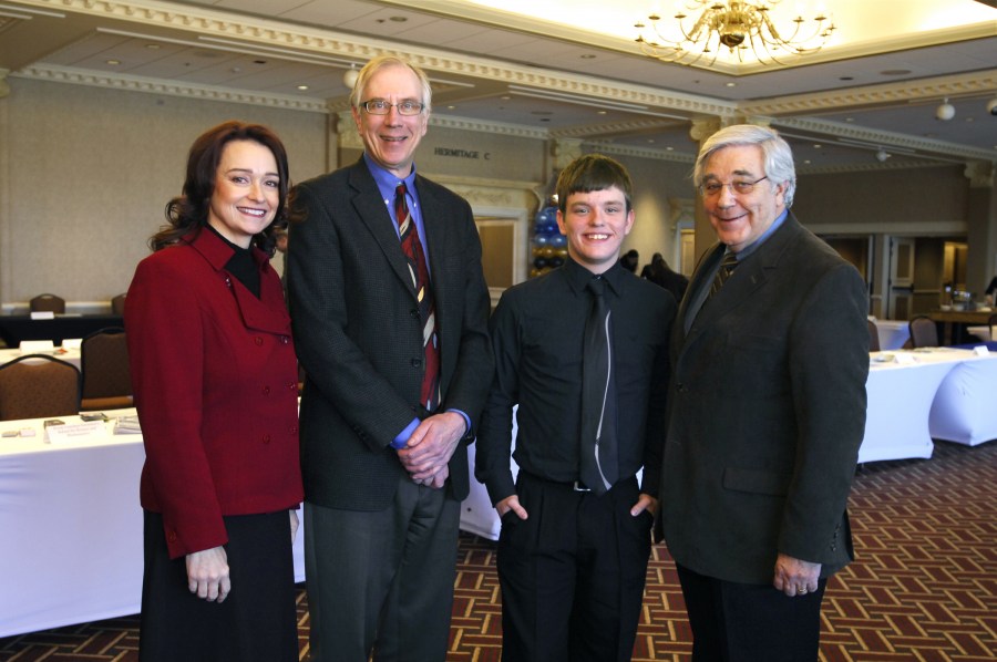 At the conference on science, technology, engineering and math (STEM) were, from left, Julie Hudson, M.D., Thomas Cech, Ph.D., Aspirnaut member Cody Strothers, and Billy Hudson, Ph.D. (photo by Anne Rayner)