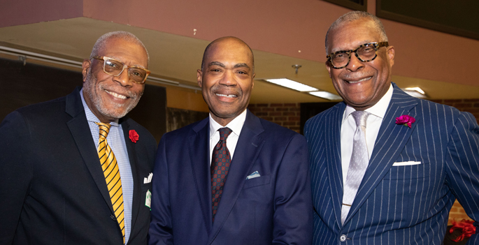 Kevin Churchwell, MD, center, with his brothers, Robert Churchwell Jr., left, and André Churchwell, MD.