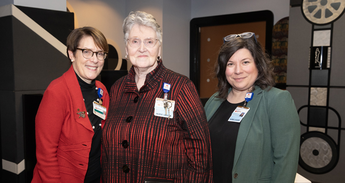 Marlee Crankshaw, center, with Meg Rush, MD, MMHC, left, and Gretchen McCullough, MSN, RN, NEA-BC. (photo by Erin O. Smith)