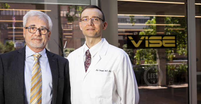 Benoit Dawant, PhD, left, Erik Tkaczyk, MD, PhD, and colleagues have developed a new way to measure the severity of monkeypox in humans.