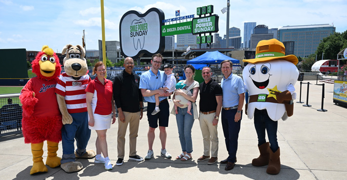 Representatives from Delta Dental and Children’s Hospital gathered June 12 at First Horizon Park in advance of the “Smile Power Sunday” Nashville Sounds game.