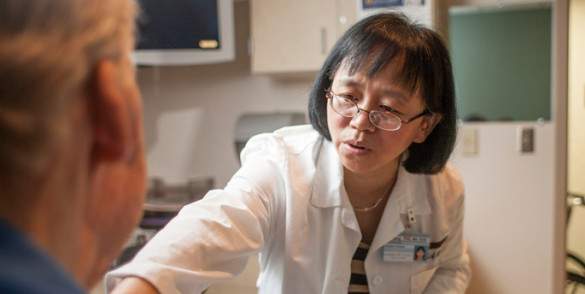 Jie Deng, Ph.D., R.N., is testing a self-care program for head and neck cancer survivors diagnosed with secondary lymphedema and fibrosis (LEF). (photo by Daniel Dubois)