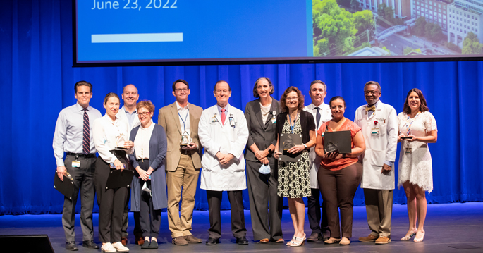 PHOTO: Award recipients and presenters gather after Thursday’s State of the Department of Medicine address. From left are Brian Lindman, MD, MSCI, Alexandra Shingina, MD, MHS, Claude Shackelford, MD, Jill Gilbert, MD, Todd Hulgan, MD, MPH, Brian Christman, MD, Kimryn Rathmell, MD, PhD, Ambra Pozzi, PhD, T. Alp Ikizler, MD, Maie El-Sourady, MD, Walter Clair, MD, MPH, and Ana Nobis, MD, MPH. (photo by Susan Urmy)