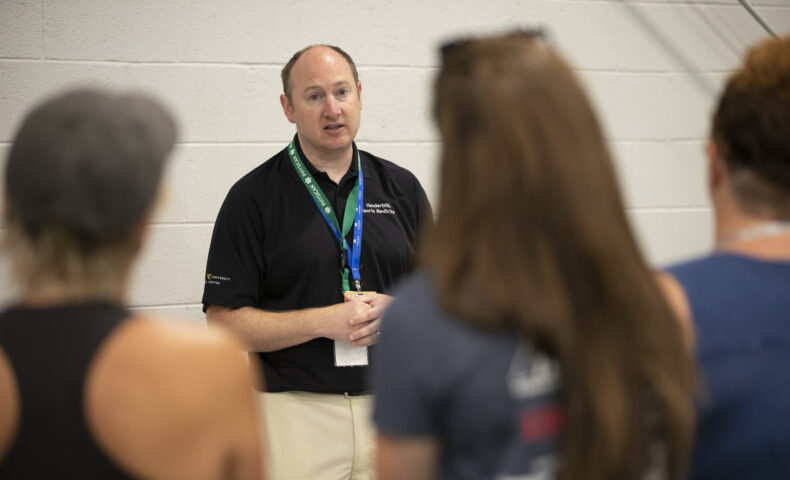 Alex Diamond, DO, MPH, speaks at a sports injury treatment training event at Green Hill High School in Mount Juliet. (photo by Erin O. Smith)