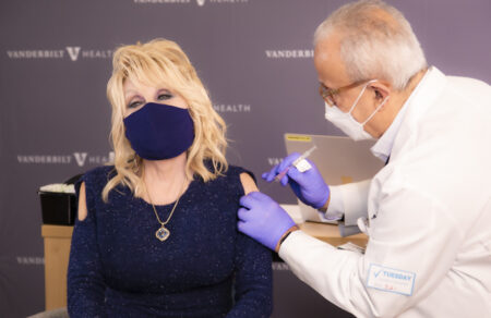 Country music icon Dolly Parton received her COVID-19 vaccination at Vanderbilt Health Tuesday, March2, from Naji Abumrad, MD, and urged everyone not to hesitate to get their vaccine when they become eligible to receive it.
