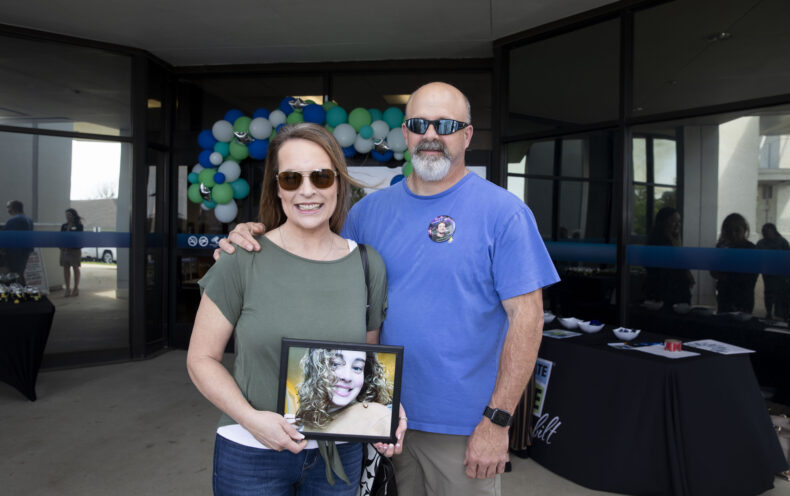 Melisa and John Chandler with a photo of their daughter, donor Hannah Chandler, at the Vanderbilt Wilson County Hospital event. (photo by Susan Urmy)