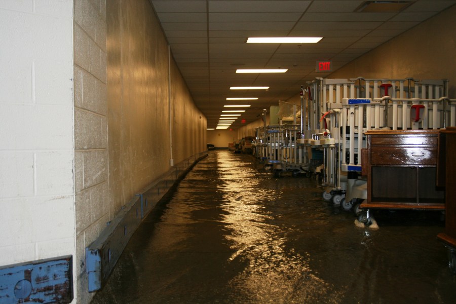 Water rushes into the Children’s Hospital basement on Sunday morning. (photo by Buddy Skipper)