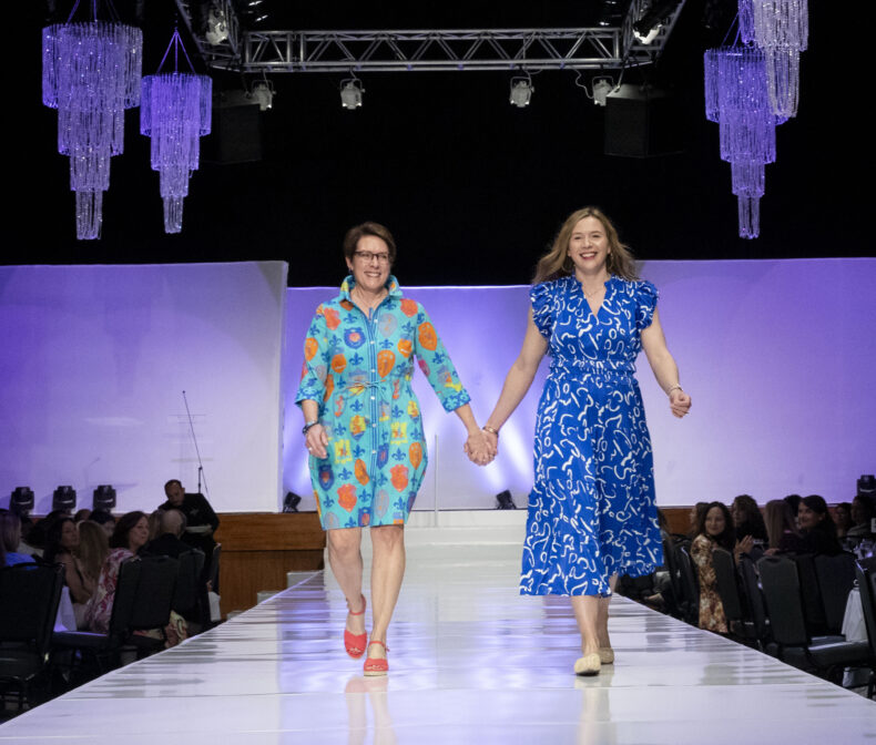 Meg Rush, MD, President of Monroe Carell Jr. Children’s Hospital at Vanderbilt, and daughter, Katie Rush, a neonatal nurse practitioner at Monroe Carell, walk the runway as part of a “health care heroes” segment during the event.