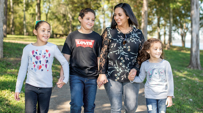 Gloria Guzman Jimenez and her children, Sophia Sapulveda, 8, left, Eduardo Sapulveda, 10, and Andrea Sapulveda, 6, participated in the GROW trial on pediatric obesity.
