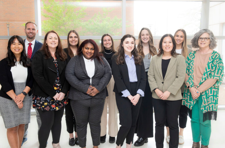 Participants in the Genetic Counseling Research Symposium were (back row from left) Lucas Richter, MM, CGC, Fellowship in Genomics Outcomes Research, (FIGOR); and Mikaela Bradley, Makenna Martin, Cecilia Kessler, and Joan Kornkven, Master’s in Genetic Counseling degree program, Class of 2024, (front row from) left, Mary Hurley, Class of 2024; Jill Slamon, MA, MS, CGC, Advanced Research Training for Genetic Counselors certificate program; Toni Lewis, MS, FIGOR; Lianna Paul, and Serena Fleming, Class of 2024; and MGC program director Martha Dudek, MS, CGC. (photo by Susan Urmy)