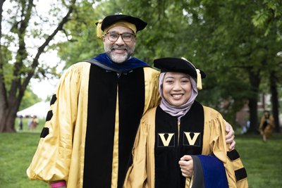Rany Octaria, MD, PhD, MPH, shown here with Peter Rebeiro, PhD, received her PhD in Epidemiology.