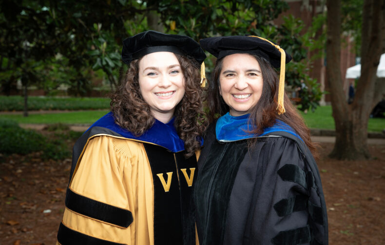 Gabriella Robertson, PhD (Cell and Developmental Biology), left, with her mentor Vivian Gama, PhD. (photo by Erin O. Smith)