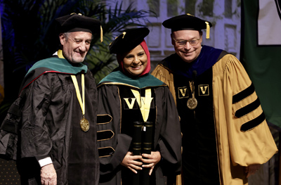 School of Medicine Founder’s Medalist Ayesha Muhammad, MD, PhD, with Dan Roden, MD, left, and Jeff Balser, MD, PhD.