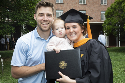 School of Nursing graduate Alexa O’Hearn with her husband, Ryan, and daughter, Maggie.