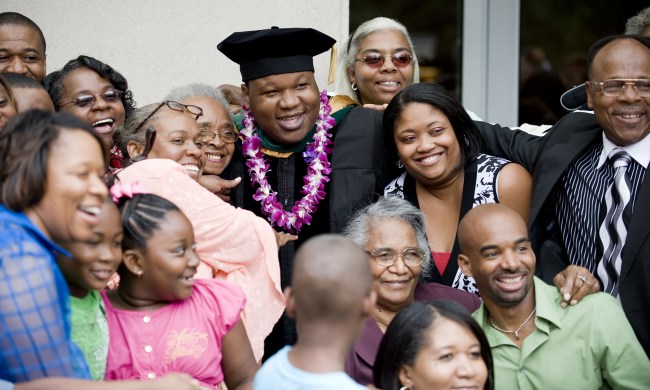 Vernon Rayford celebrates with some of the 40 family members who came to see him graduate from the School of Medicine. (photo by Joe Howell)