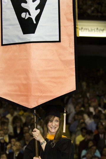 Lauren Sims Carlson carries the VUSN banner. (photo by Susan Urmy)