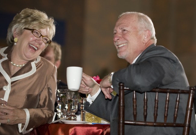 Harry Jacobson, M.D., and his wife, Jan, share a laugh during a dinner held last week to celebrate Jacobson’s tenure as vice chancellor for Health Affairs. (photo by Joe Howell)