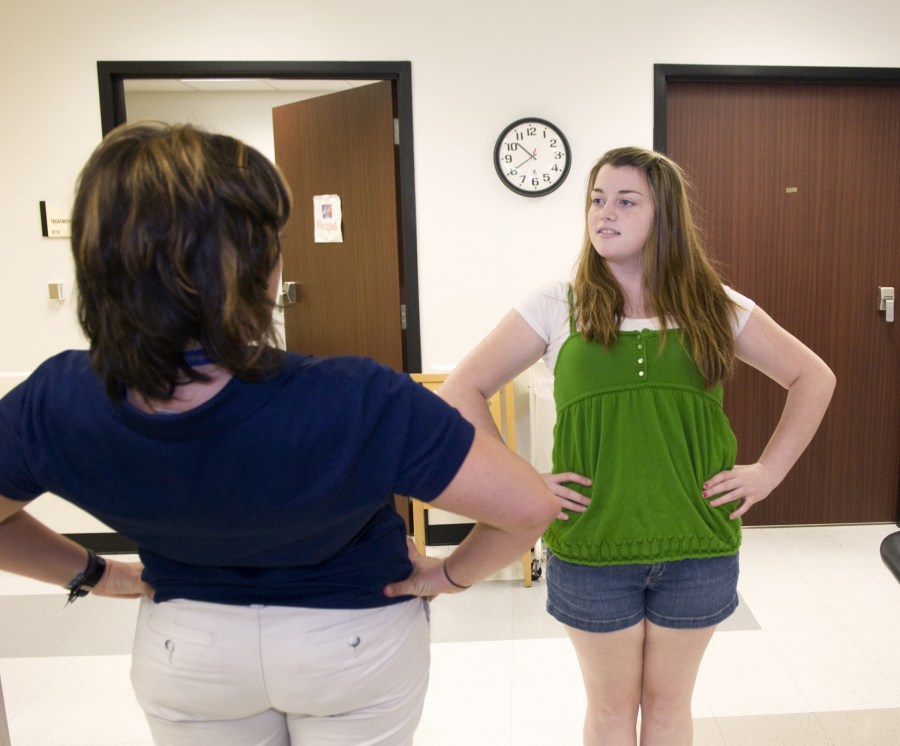 Overton High School’s Rachel Faith Clark takes part in an orthopaedic screening. (photo by Susan Urmy)