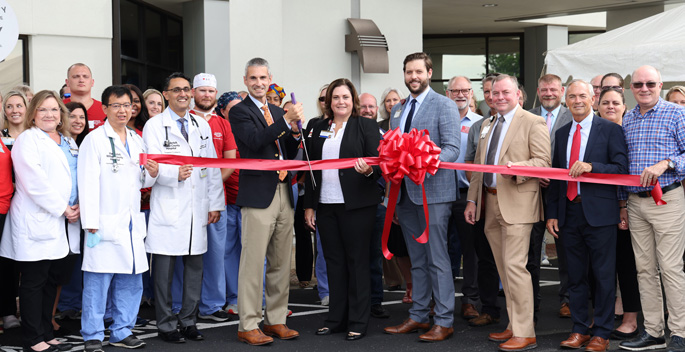 Officials with Vanderbilt Wilson County Hospital cut the ribbon celebrating the relaunch of the hospital’s percutaneous coronary intervention program. (photo by Donn Jones)