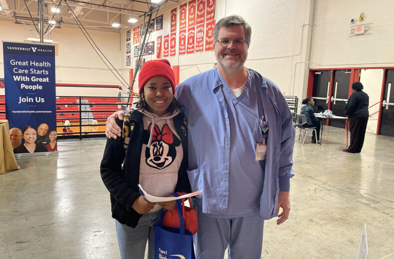 Neil Jess, BSN, RN, CNOR, and Pearl-Cohn High School student Aries Beck.