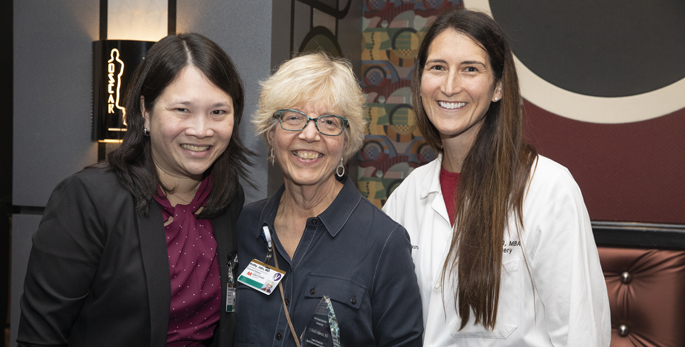 Beatrice Concepcion, MD, left, Kathy Jabs, MD, and Rachel Forbes, MD, MBA, pose at Monday’s event celebrating the 60th anniversary of Vanderbilt’s first kidney transplant.
