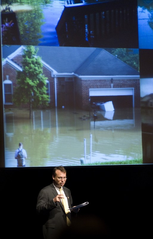 Jeff Balser, M.D., Ph.D., reviews Vanderbilt’s flood relief efforts at Tuesday’s Leadership Assembly. (photo by Susan Urmy)