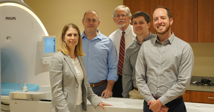 Team members involved in the study include, from left, Melissa Hilmes, MD, Daniel Moore, MD, PhD, Alvin Powers, MD, Jon Williams, PhD, and Jack Virostko, PhD. (photo by Jessica Kimber)