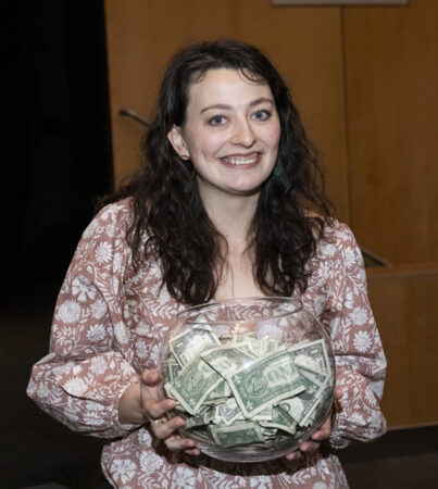 As the last student to learn their match location, Morgan Sexton took home the traditional fishbowl full of dollars. She is headed to Brigham and Women’s Hospital for her anesthesiology residency. (photo by Susan Urmy)