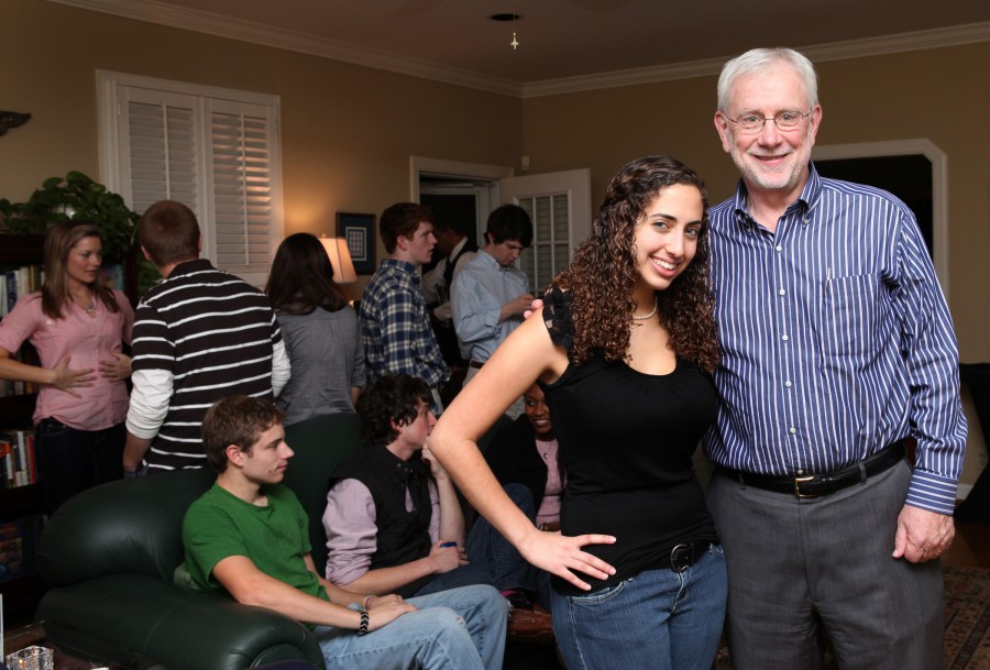 University Provost Richard McCarty relishes his time with his Vanderbilt Visions group of first-year students. Here he talks with Ashley Bekerman, the group’s peer mentor, during a dinner at McCarty’s house last fall. (photo by Susan Urmy)