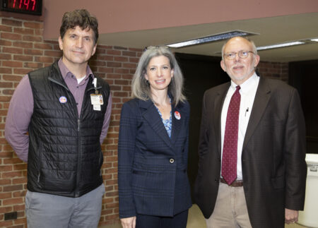 Among those attending the lecture were, from left, Joe Fanning, PhD, Lisa Harris, MD, PhD, and Keith Meador, MD. (photo by Erin O. Smith)