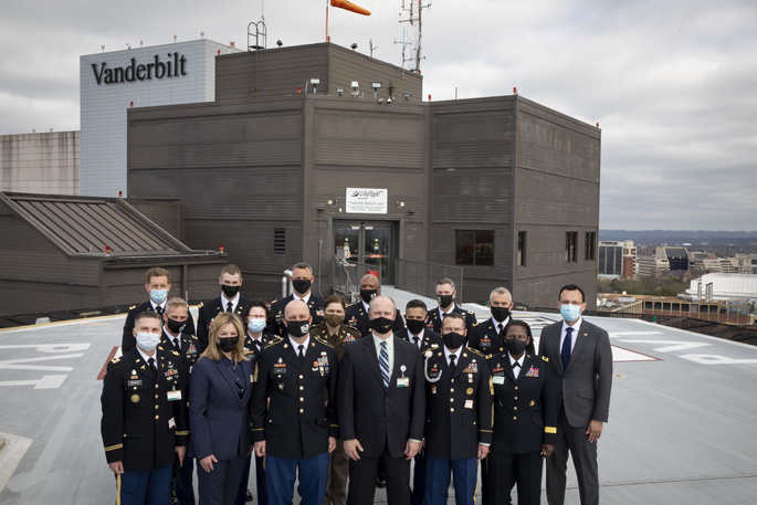 Representatives from the U.S. Army Surgeon General’s Office and VUMC pose for a group photo on the LifeFlight helipad. 