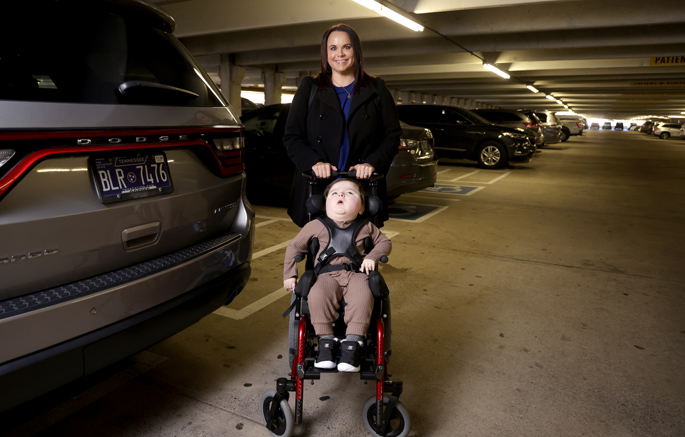 New, larger-sized accessible parking spaces are making it easier for Becca Parker to take her son, Samuel, to clinic visits at Monroe Carell Jr. Children’s Hospital at Vanderbilt. (photo by Donn Jones)