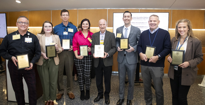 VUMC’s first Pursuit of Excellence Award winners include, from left, Johnny Woodard, MSN, RN-BC, Tiffany Lewis, MSN, RN, Kevin Harvey, BSN, RN VA-BC, Jarylin Bishop, BSN, RN, Randy Cox, MPH, CPPS, Phil Cook, MHA, Bill Wester, MD, MPH, Cristin Fritz, MD, MPH.